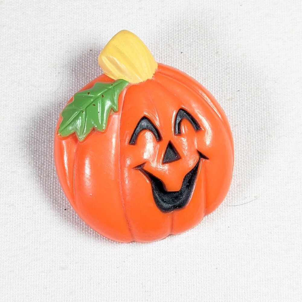 Vintage Laughing pumpkin Halloween brooch, plastic pumpkin pin made in Hong Kong
